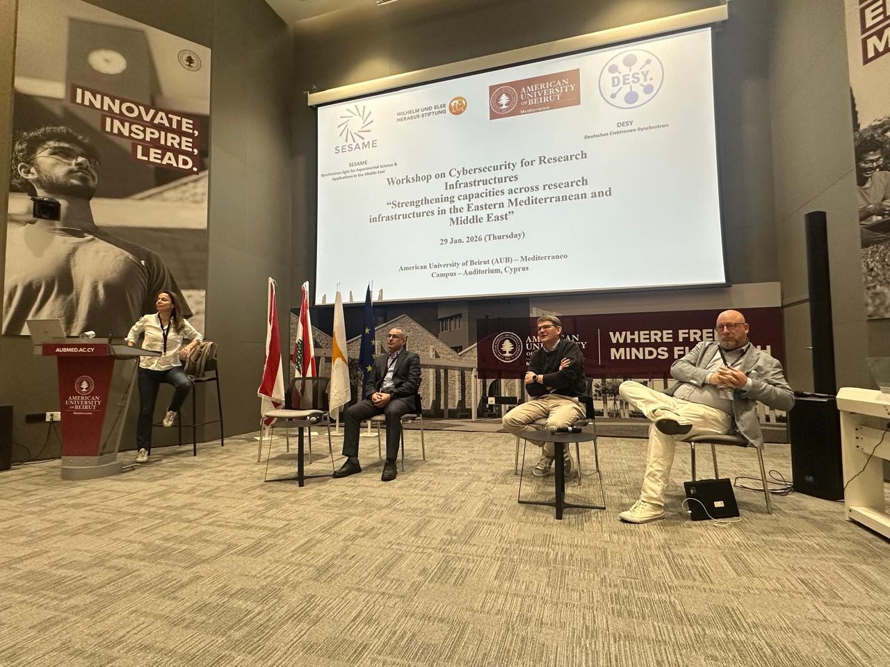 © SESAME 2026, left to right: Eleni Agathocleous (The Cyprus Institute) moderating the panel discussion with Salman Matalgah (SESAME), Carsten Porthun (DESY), Stefan Lüders (CERN). 