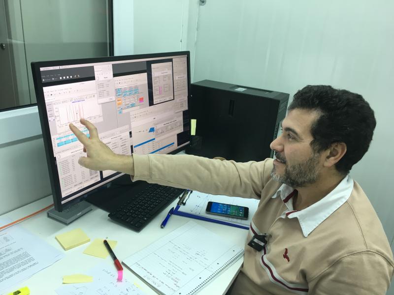 SESAME XAFS/XRF beamline scientist, Messaoud Harfouche, points out SESAME’s first monochromatic light