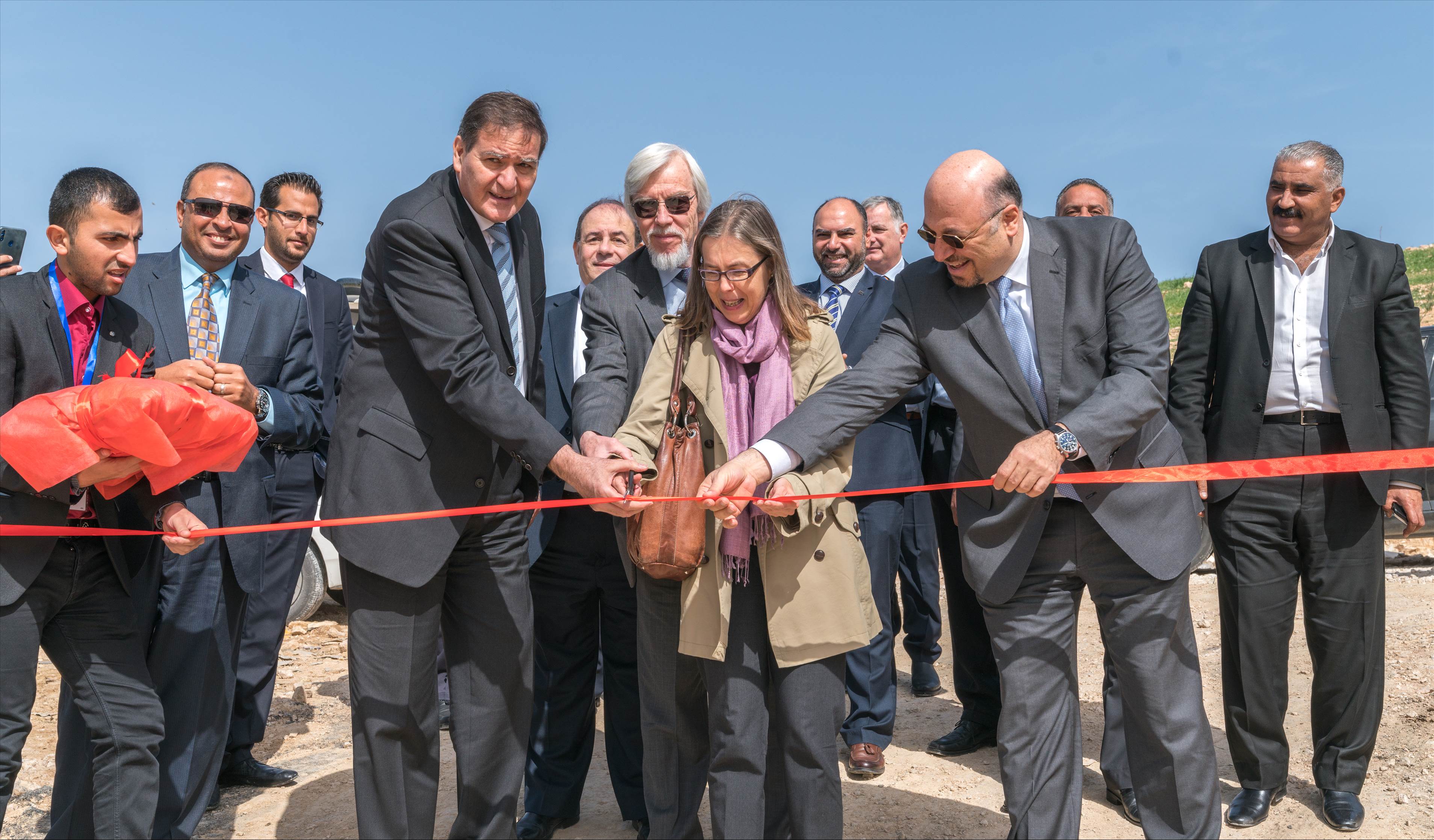 Dignitaries formally inaugurate SESAME's solar energy plant. Cutting the ribbon are (left to right): SESAME Director Khaled Toukan, President of the SESAME Council, Rolf Heuer and Sirpa Tulia, representing the Head of the EU Delegation to Jordan.