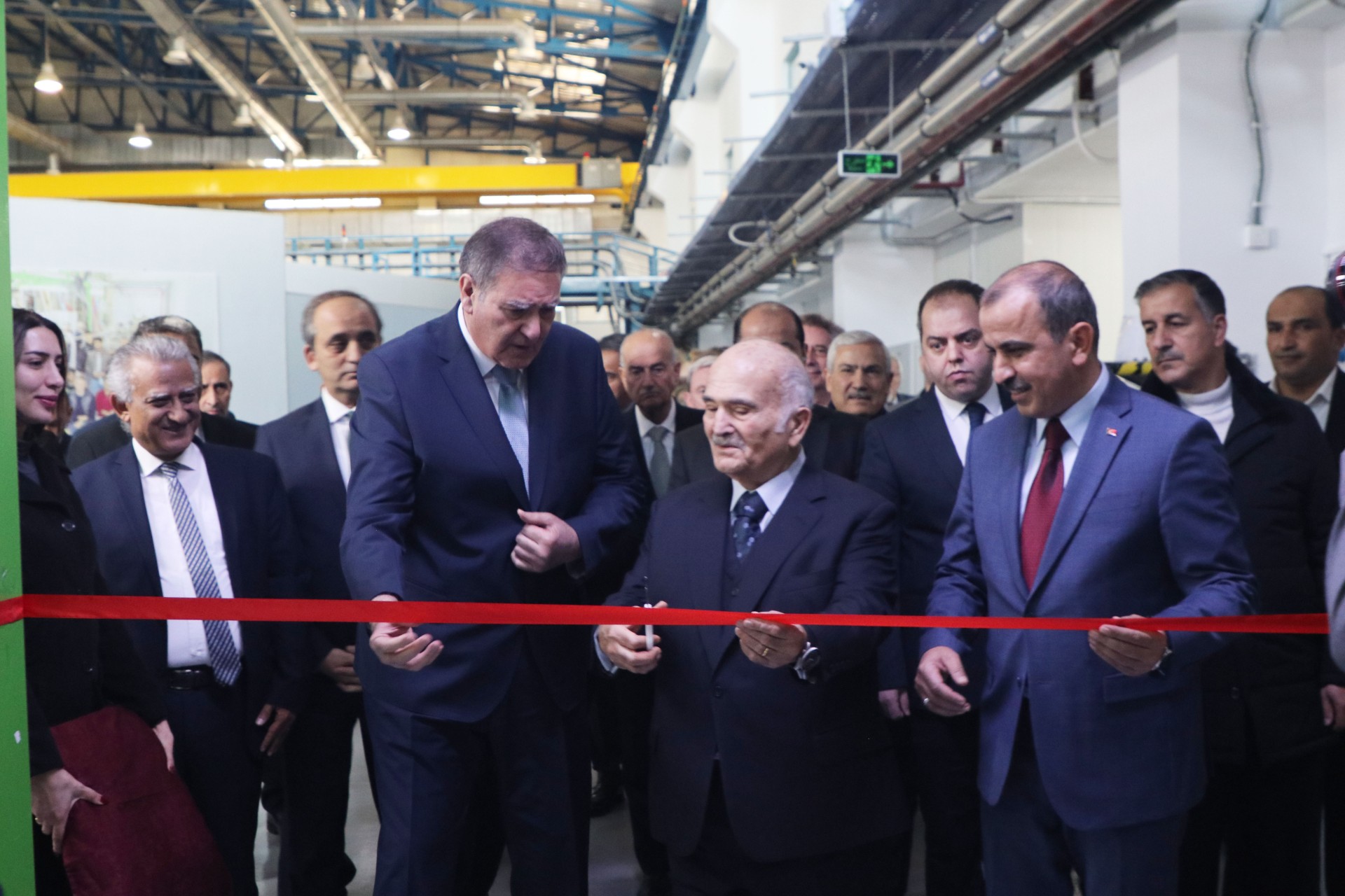© SESAME 2025: HRH Prince El Hassan bin Talal about to cut the ribbon of the TXPES beamline held by Khaled Toukan, Director of SESAME, and Yakup Caymazoğlu, Ambassador of the Republic of Türkiye to the Hashemite Kingdom of Jordan.